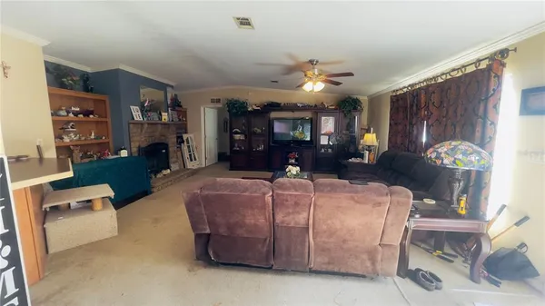 a bed room with furniture and a window