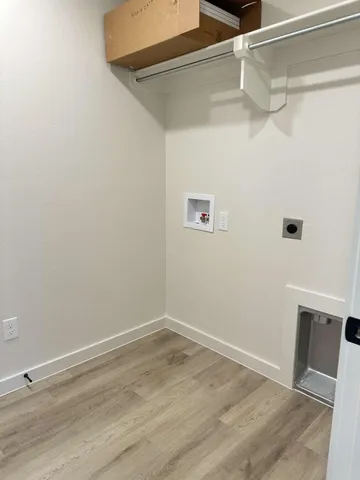 an empty room with closet area