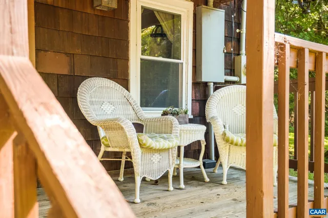 a backyard of a house with a yard and fountain