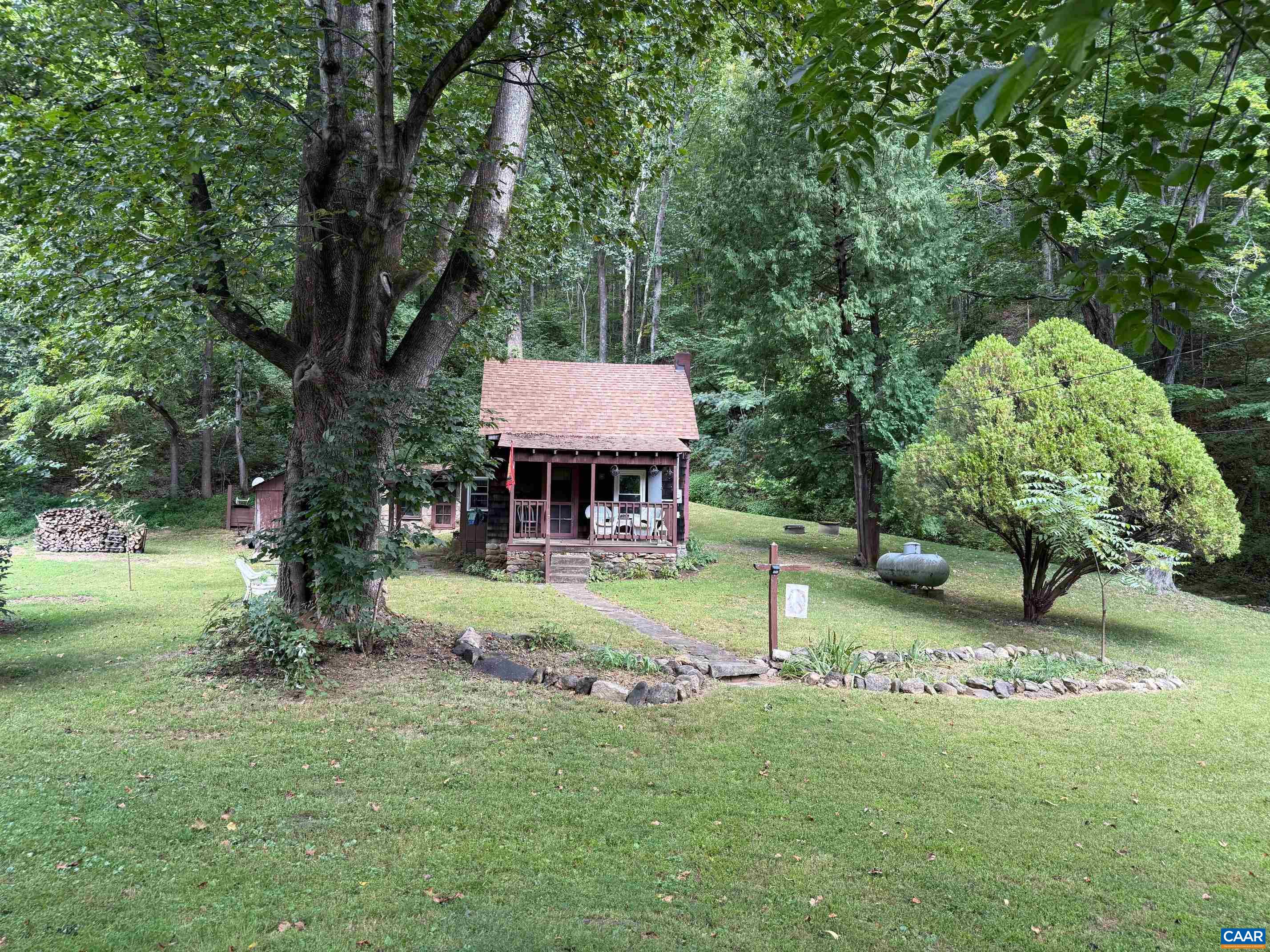 2960 Beech Grove Road Roseland, VA 22967 - Photo 15 of 73 a front view of a house with garden