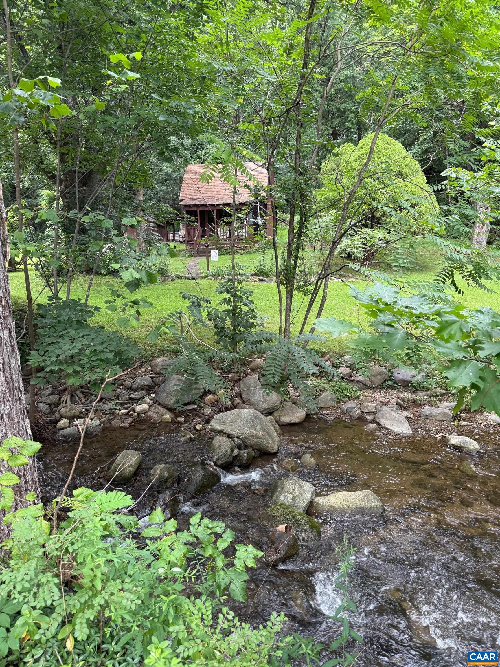 2960 Beech Grove Road Roseland, VA 22967 - Photo 2 of 73 a backyard of a house with lots of green space