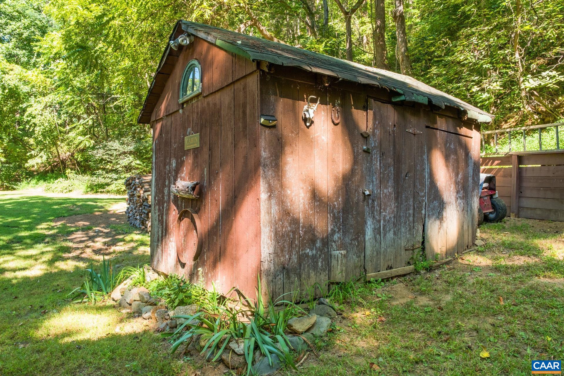 2960 Beech Grove Road Roseland, VA 22967 - Photo 25 of 73 a backyard of a house with lots of green space