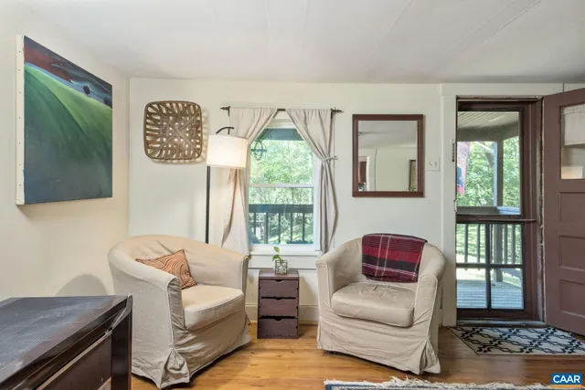 a bed room with a bed and a window