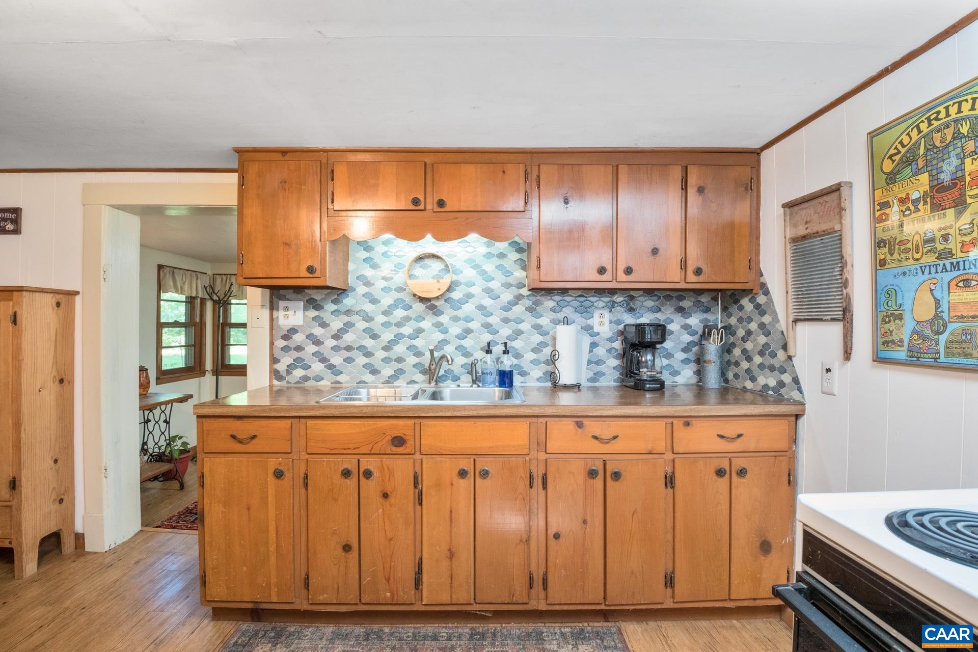 2960 Beech Grove Road Roseland, VA 22967 - Photo 38 of 73 a view of a kitchen with wooden floor and cabinets