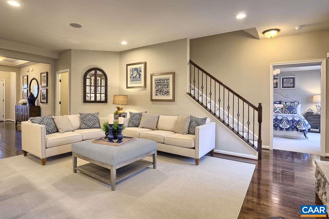 1610 Fowler Ridge Court Charlottesville, VA 22901 - Photo 8 of 27 a living room with furniture and wooden floor