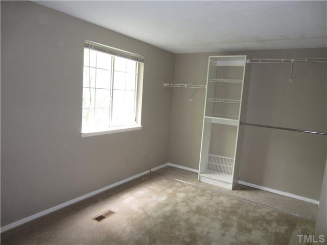 7704 Sandra Lane Raleigh, NC 27615 - Photo 12 of 17 an empty room with windows