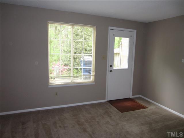 7704 Sandra Lane Raleigh, NC 27615 - Photo 15 of 17 an empty room with windows