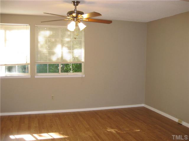 7704 Sandra Lane Raleigh, NC 27615 - Photo 8 of 17 a view of an empty room with a window