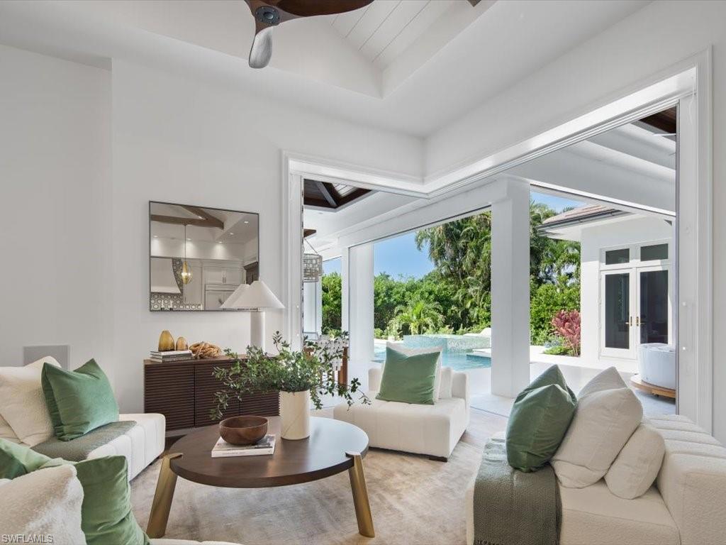 620 Binnacle Drive Naples, FL 34103 - Photo 18 of 49 Sunroom / solarium featuring vaulted ceiling