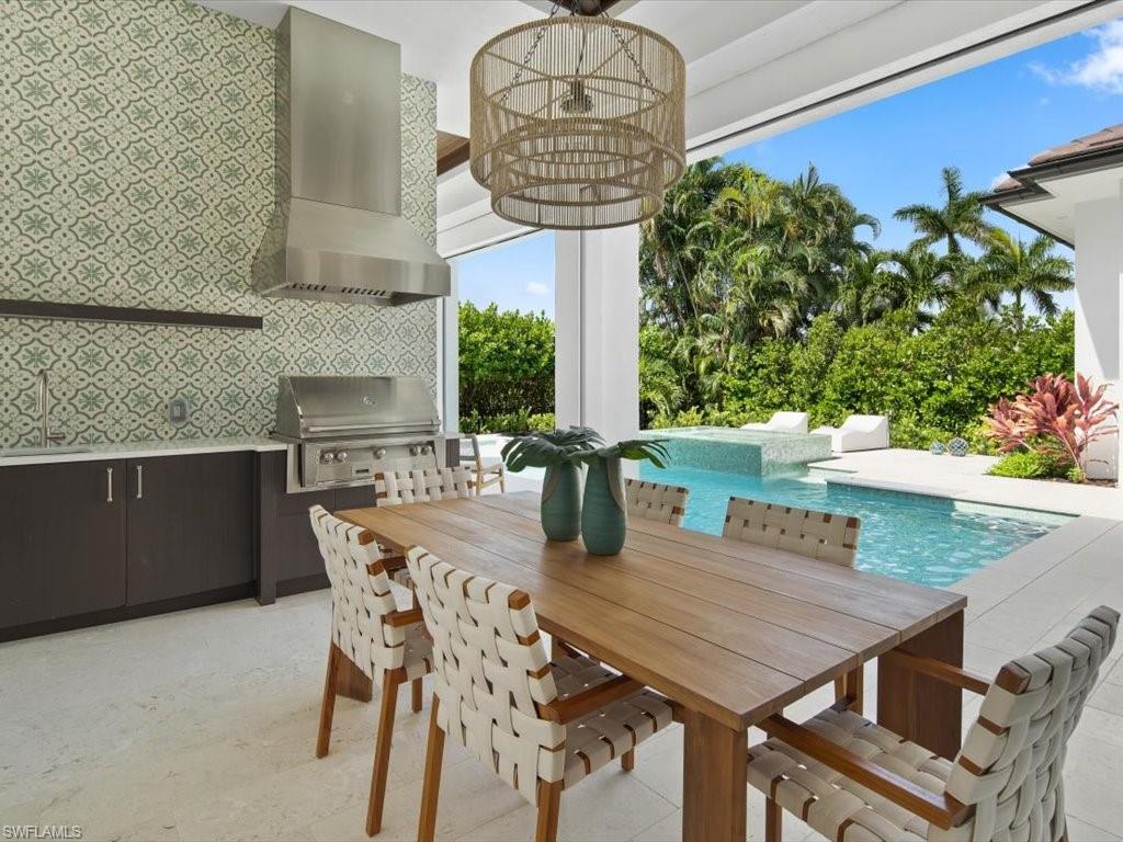 620 Binnacle Drive Naples, FL 34103 - Photo 28 of 49 Dining area with sink