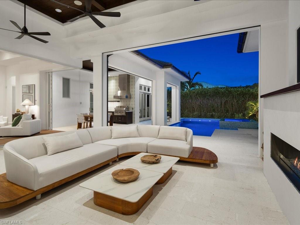 620 Binnacle Drive Naples, FL 34103 - Photo 36 of 49 Living room featuring ceiling fan