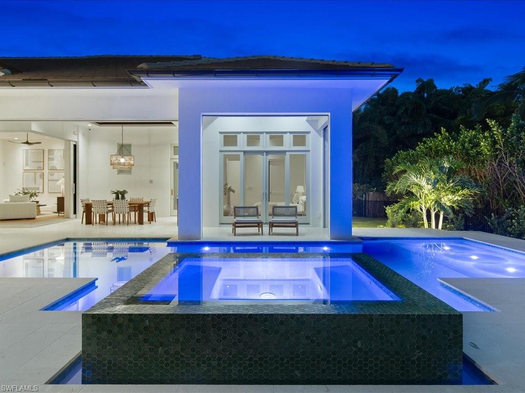 620 Binnacle Drive Naples, FL 34103 - Photo 40 of 49 View of pool featuring ceiling fan and a patio area