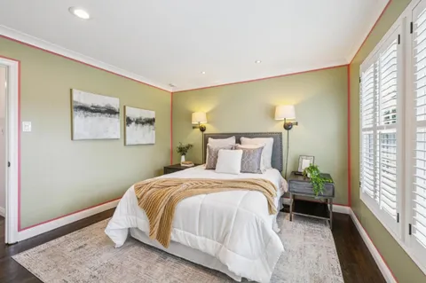 a view of house with outdoor seating and city view