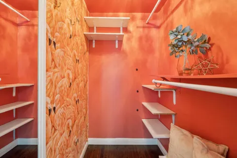 a view of a house with swimming pool and a yard