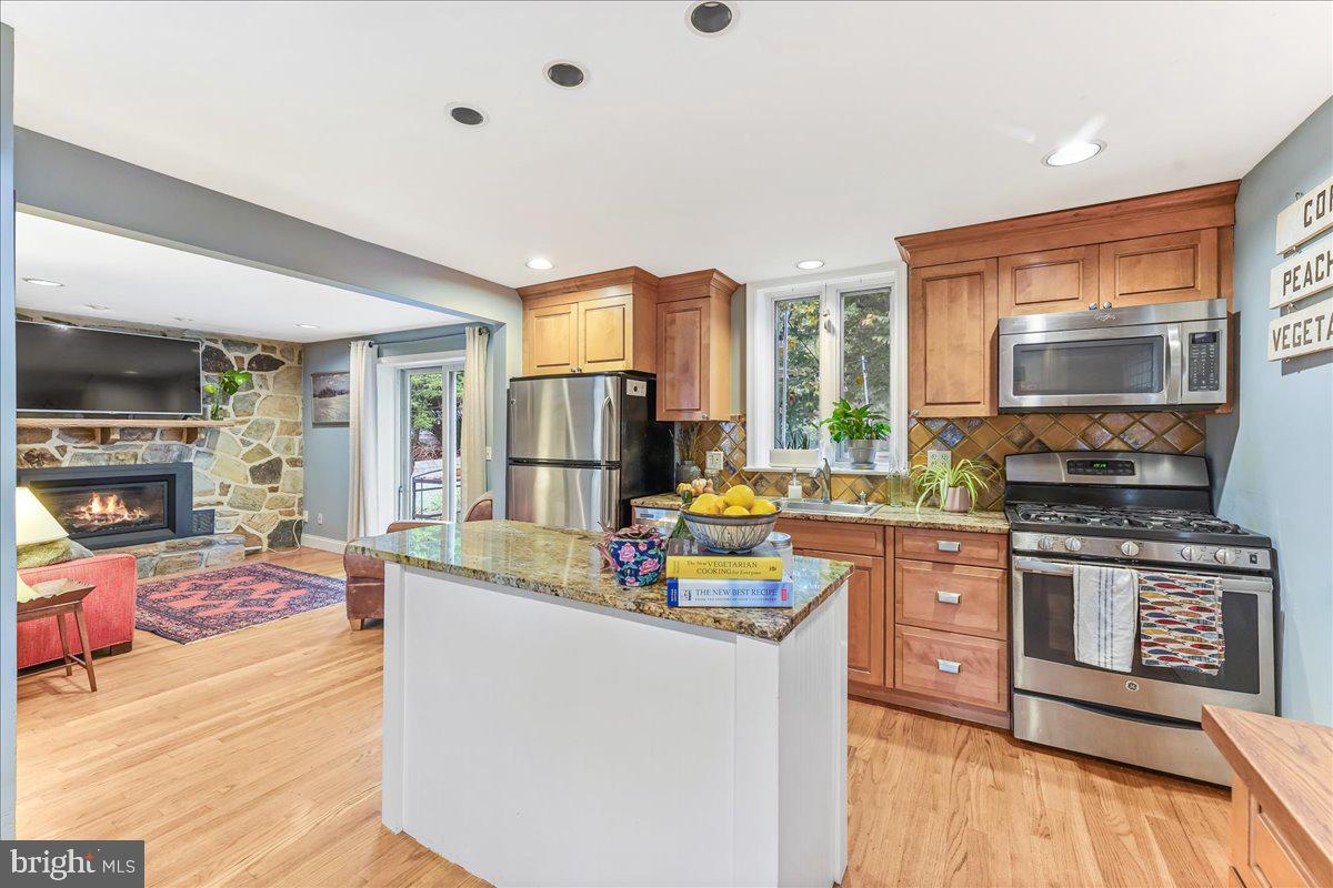 42 Preston Road Media, PA 19063 - Photo 12 of 35 a kitchen that has a stove a refrigerator and a stove top oven