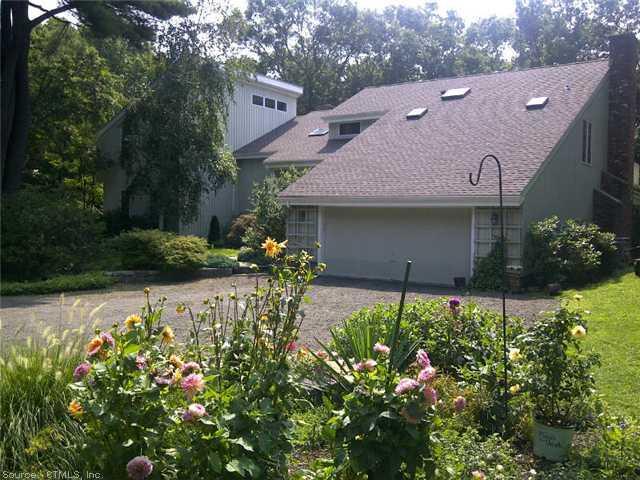 100 Watering Pond Road Guilford, CT 06437 - Photo 1 of 1 front view of a house with a yard