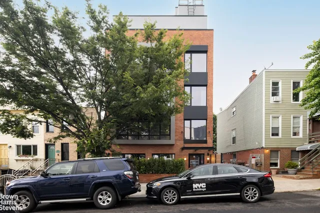 a car parked in front of a house