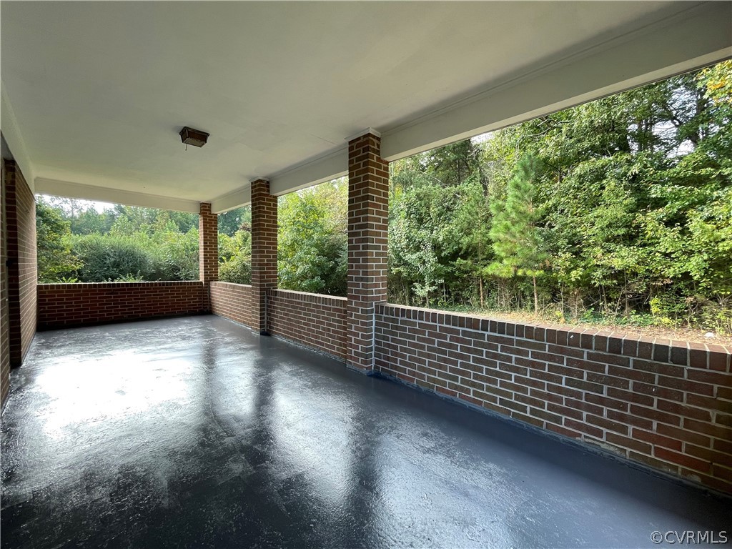 298 John Randolph Road Farmville, VA 23901 - Photo 30 of 50 a view of balcony with floor to ceiling window and wooden floor