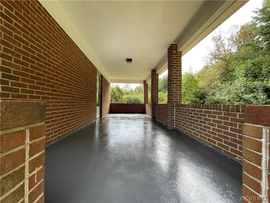 298 John Randolph Road Farmville, VA 23901 - Photo 31 of 50 a view of a balcony with wooden floor and fence