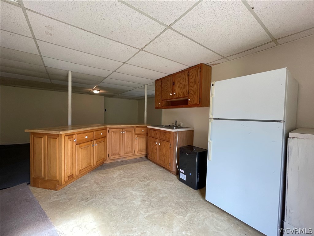 298 John Randolph Road Farmville, VA 23901 - Photo 36 of 50 a kitchen with refrigerator and cabinets