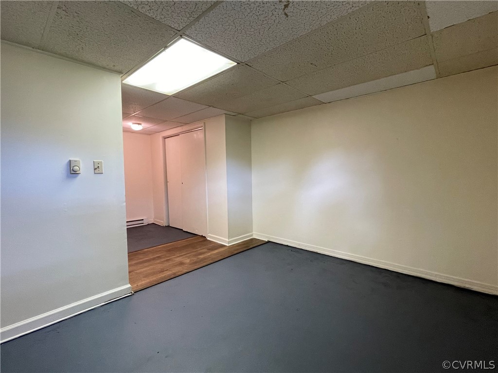 298 John Randolph Road Farmville, VA 23901 - Photo 38 of 50 an empty room with wooden floor and windows