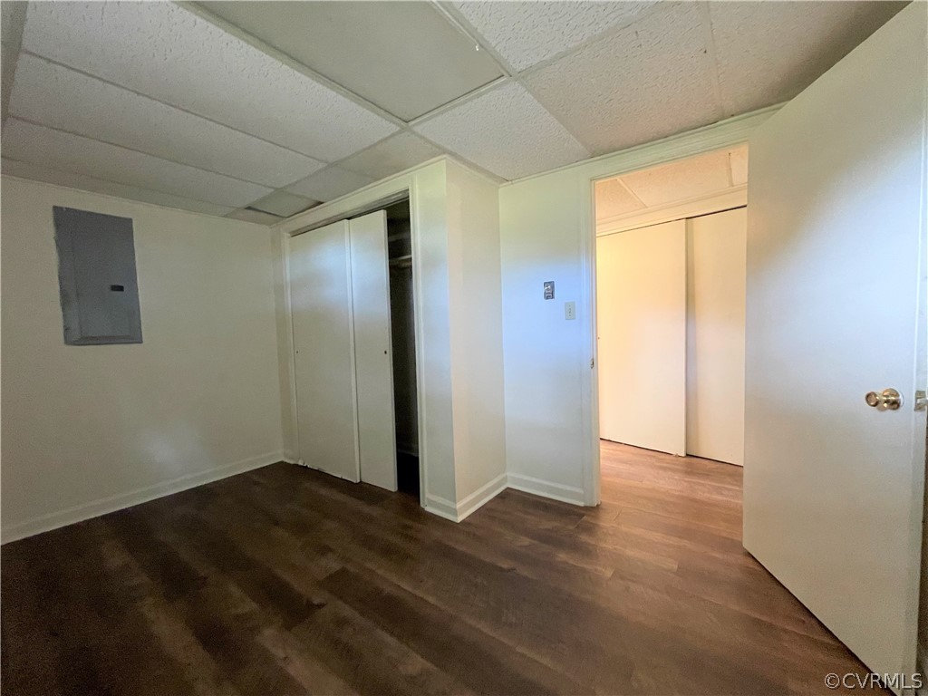 298 John Randolph Road Farmville, VA 23901 - Photo 39 of 50 an empty room with wooden floor and windows