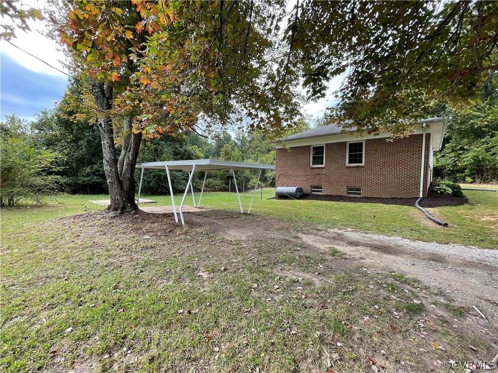 298 John Randolph Road Farmville, VA 23901 - Photo 45 of 50 a view of a house with backyard