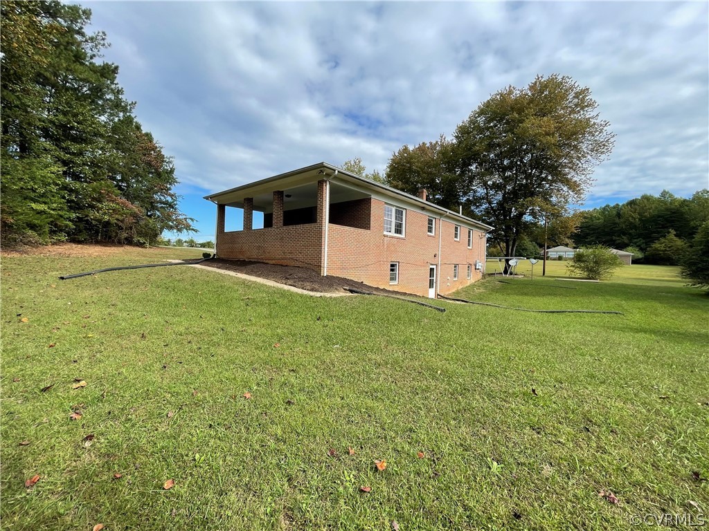 298 John Randolph Road Farmville, VA 23901 - Photo 47 of 50 a white house with a big yard and large trees