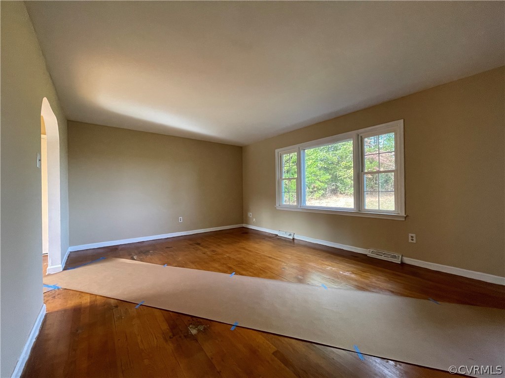 298 John Randolph Road Farmville, VA 23901 - Photo 6 of 50 an empty room with an empty space and window