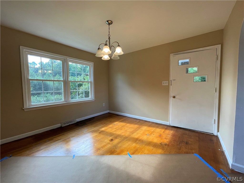298 John Randolph Road Farmville, VA 23901 - Photo 10 of 50 a view of empty room with window and chandelier
