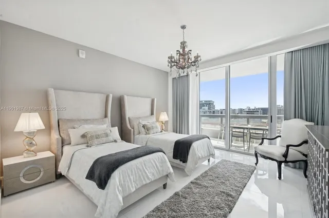 a bedroom with a bed and a chair