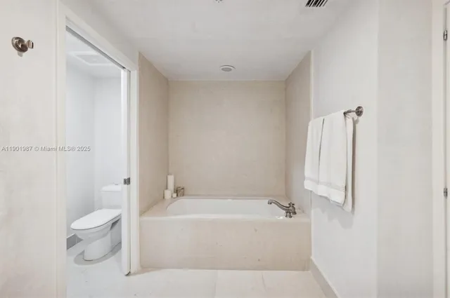 a bathroom with a sink a mirror and a shower