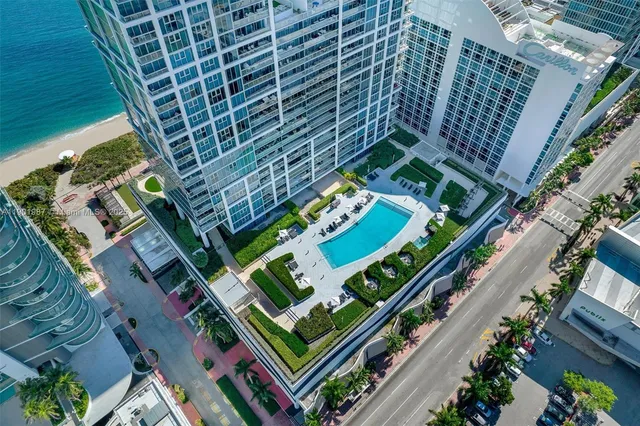 a picture of a building with a garden