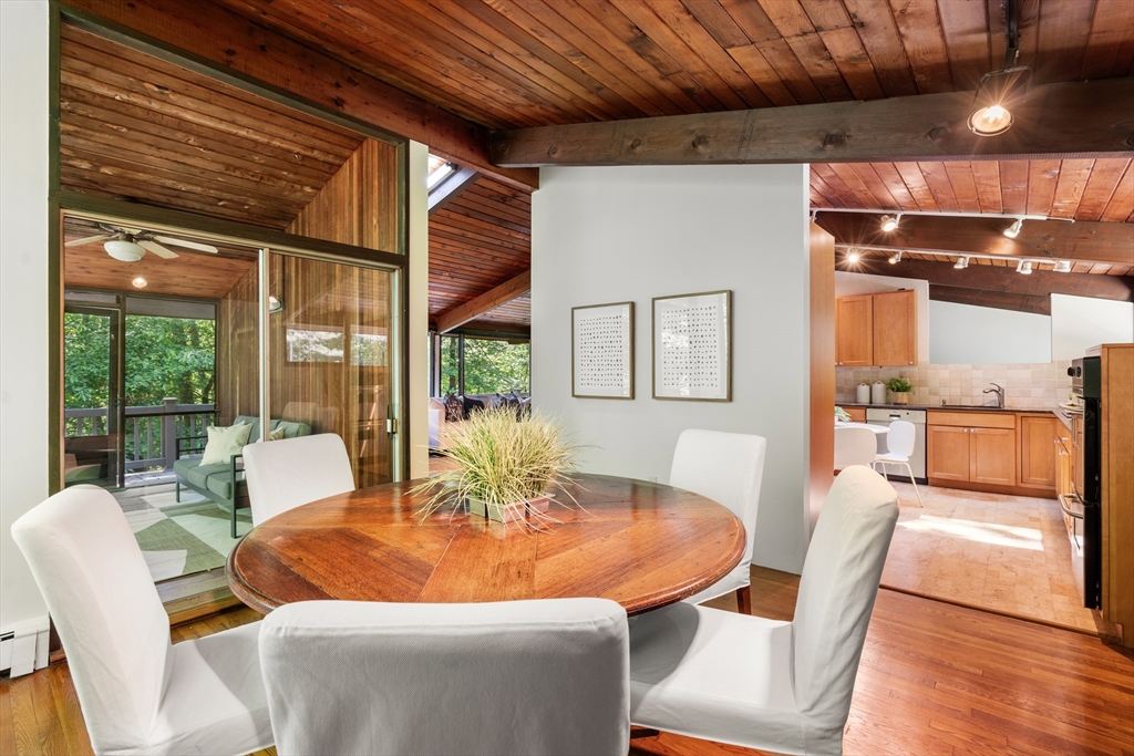 35 Sedgemeadow Road Wayland, MA 01778 - Photo 15 of 29 a dining room with furniture and wooden floor