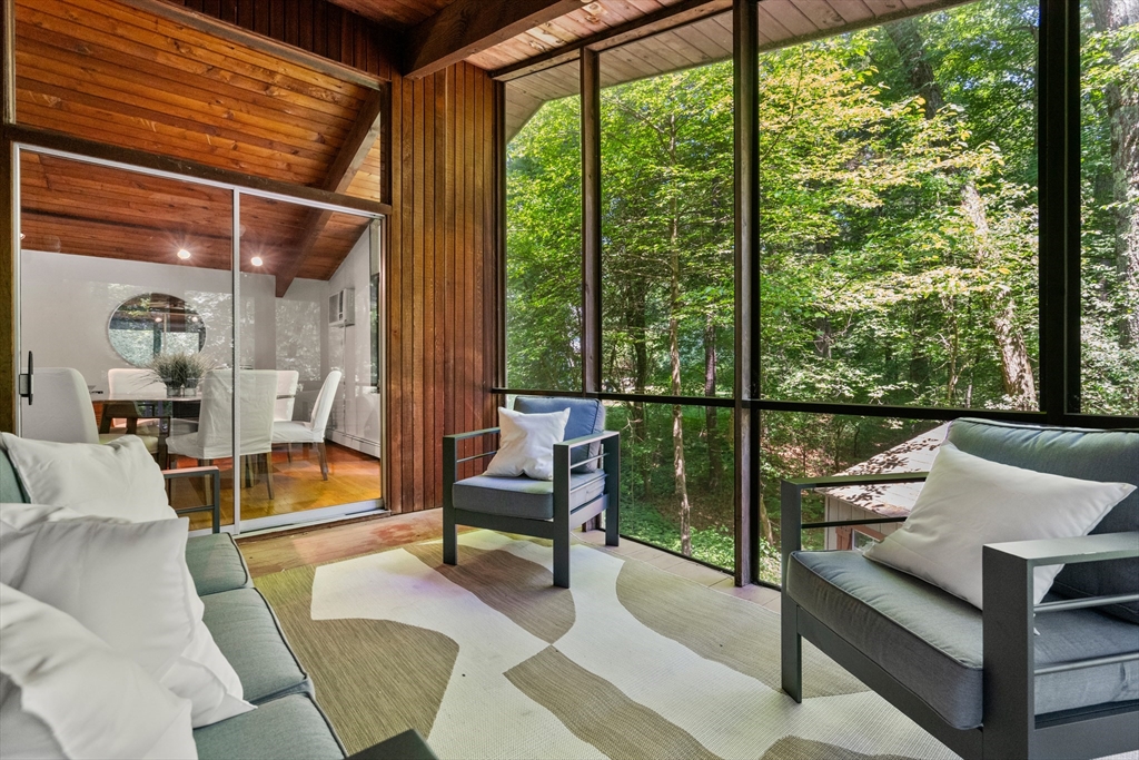 35 Sedgemeadow Road Wayland, MA 01778 - Photo 17 of 29 a living room with furniture and a floor to ceiling window