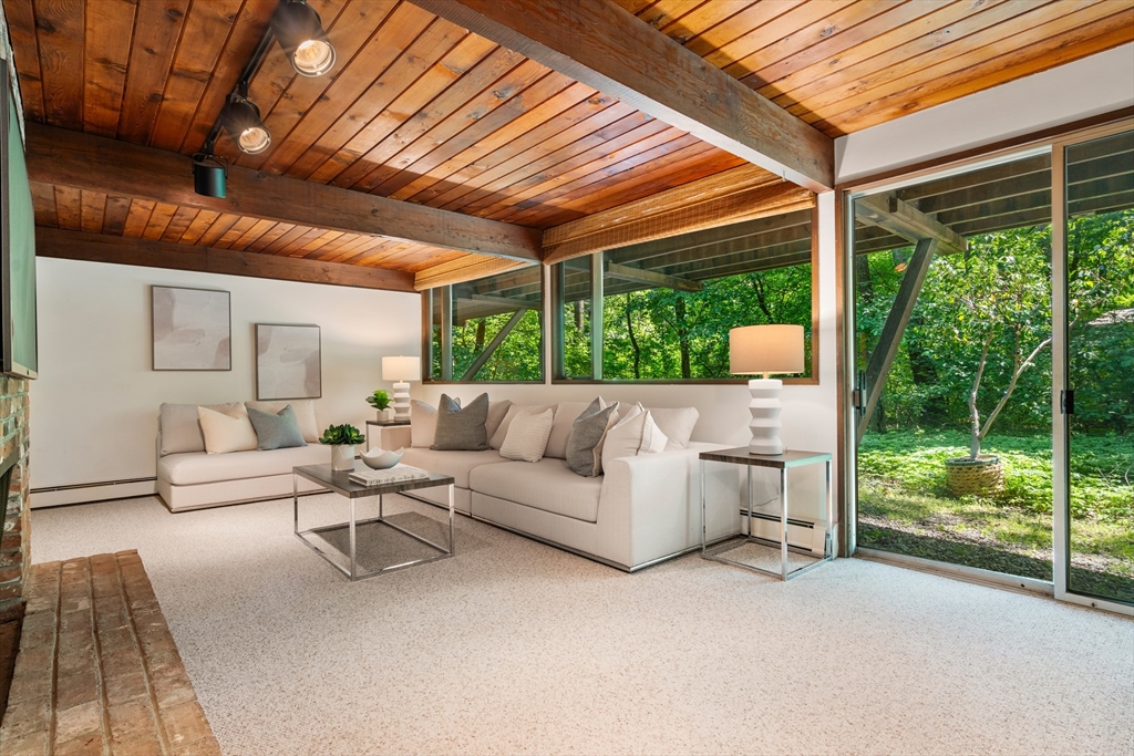 35 Sedgemeadow Road Wayland, MA 01778 - Photo 24 of 29 a outdoor space with patio the couches and a dining table with garden view