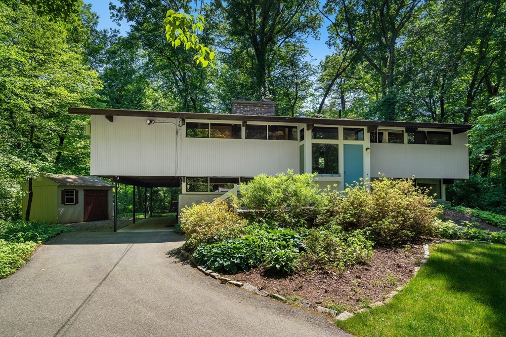 35 Sedgemeadow Road Wayland, MA 01778 - Photo 3 of 29 front view of a house with a garden