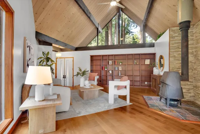 a kitchen with stainless steel appliances granite countertop a sink and a stove