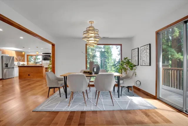 a bed room with a bed and a large window