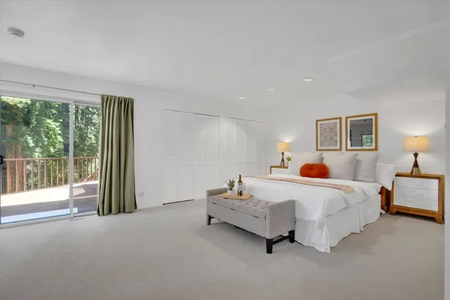 a bathroom with a shower sink and mirror