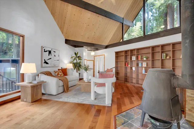 a bedroom with a bed and a couch