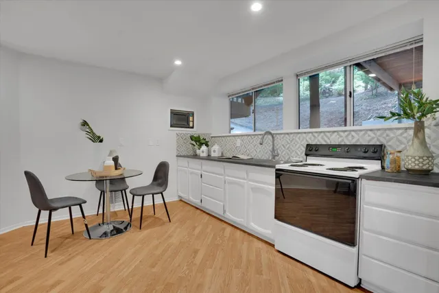 a view of a storage & utility room with racks on the wall