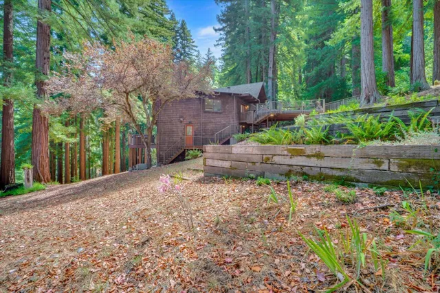 a front view of a house with garden