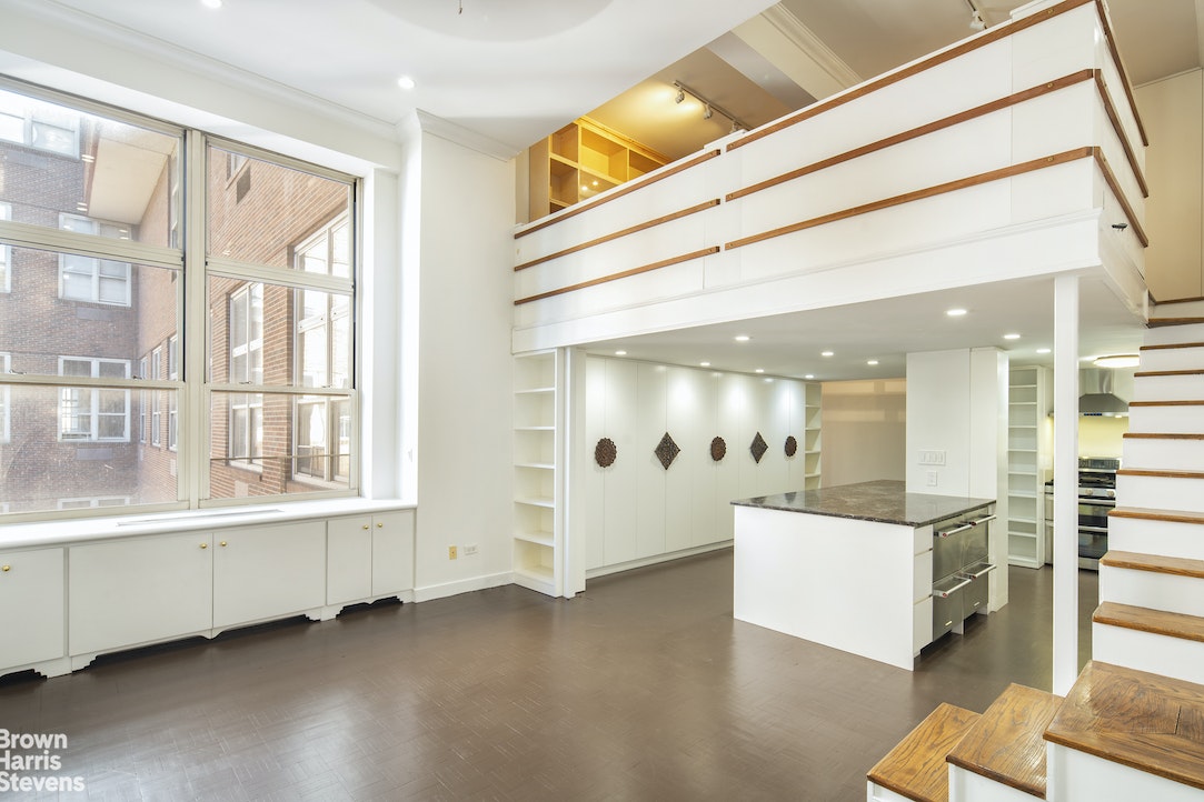 120 East 87th Street, Unit R18H Manhattan, NY 10128 - Photo 3 of 13 a view of an entryway with wooden floor and windows