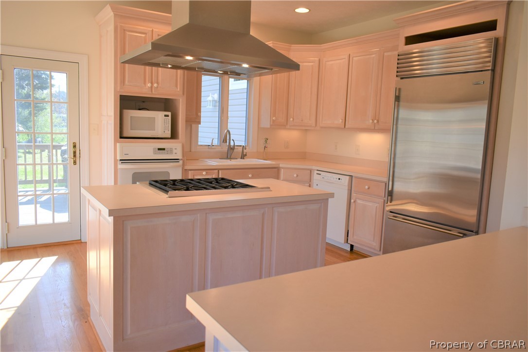 163 Mill Lane Road Cardinal, VA 23025 - Photo 19 of 50 a kitchen with stainless steel appliances a refrigerator a sink a stove and white cabinets