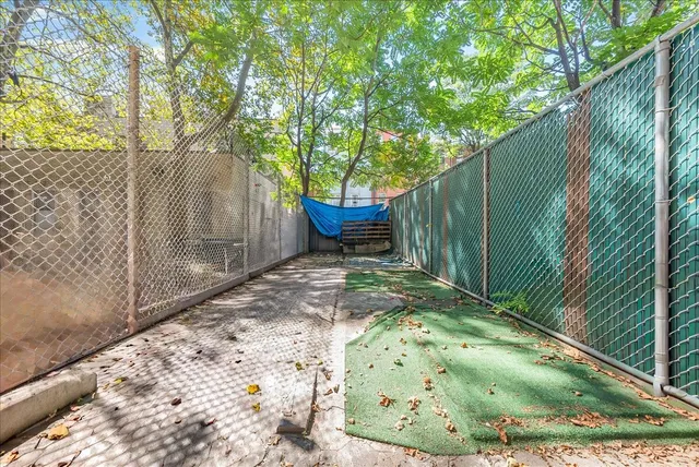 a view of a back yard of the house