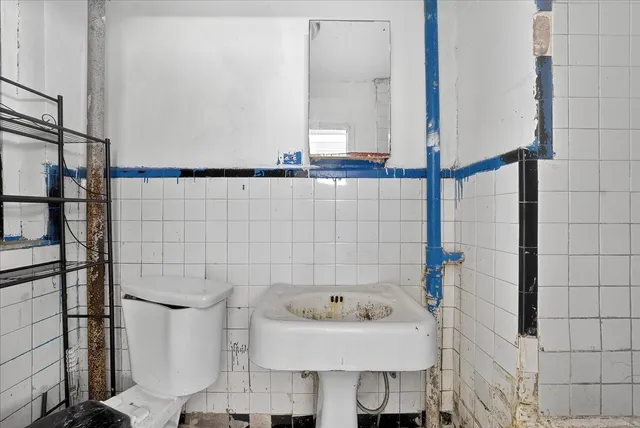 a bathroom with a sink and a shower