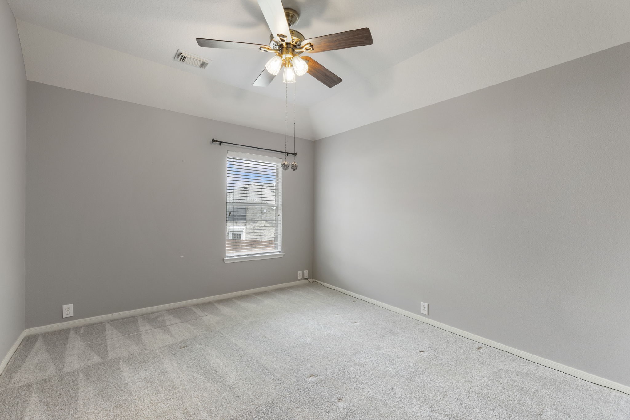 2907 Stemwood Drive Spring, TX 77388 - Photo 22 of 33 Secondary bedroom featuring plush carpeting, soft natural light, and a spacious layout with neutral finishes ready for personalization.