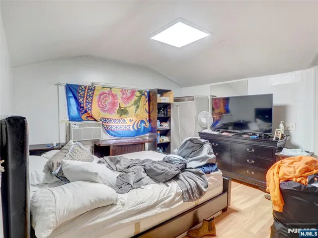 a bedroom with furniture and a bed