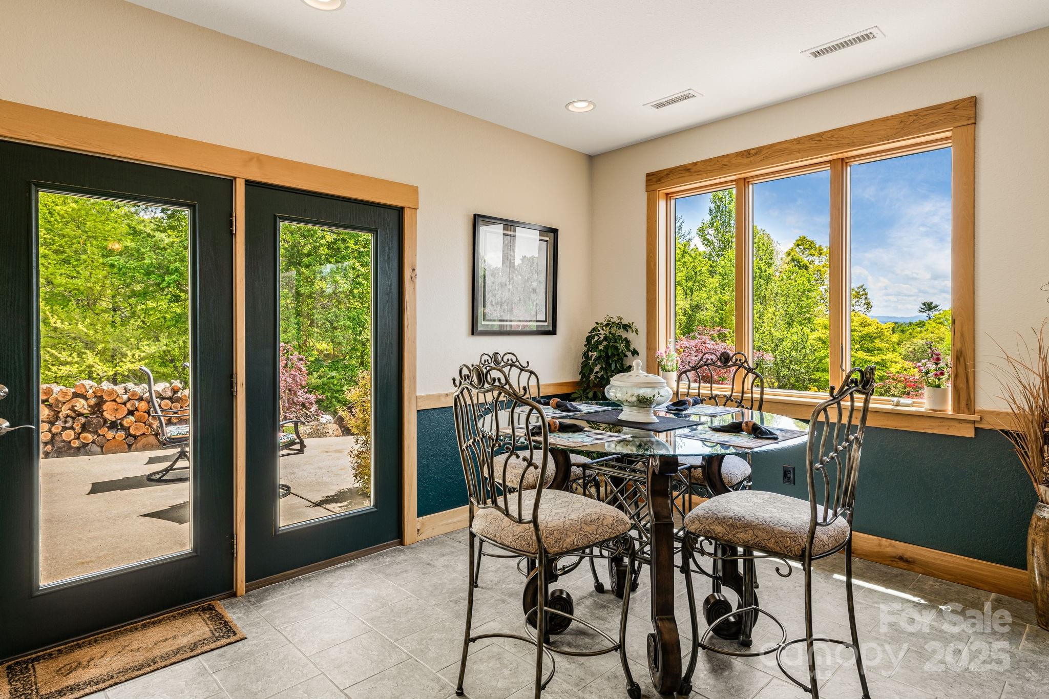 2912 Windswept Ridge Road Marshall, NC 28753 - Photo 13 of 47 a view of a dining room with furniture window and outside view